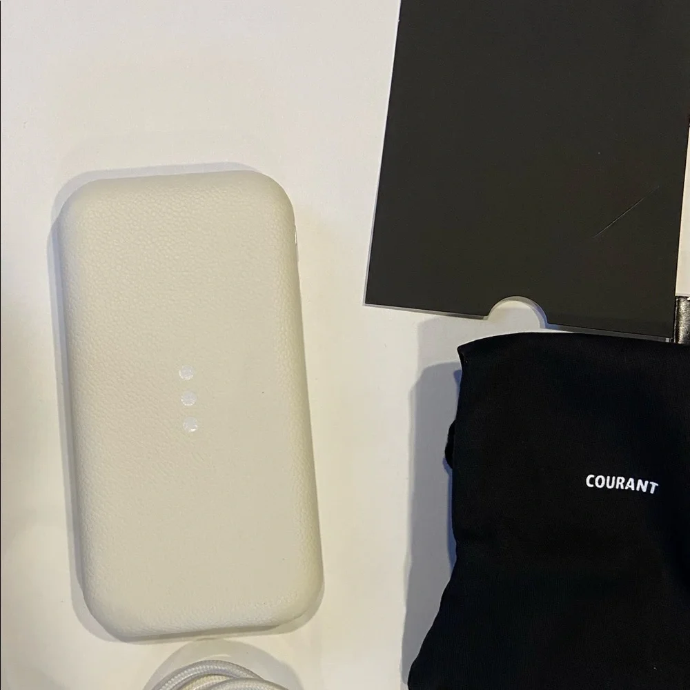 New in Box Courant Carry Wireless Charging Bank for Phones